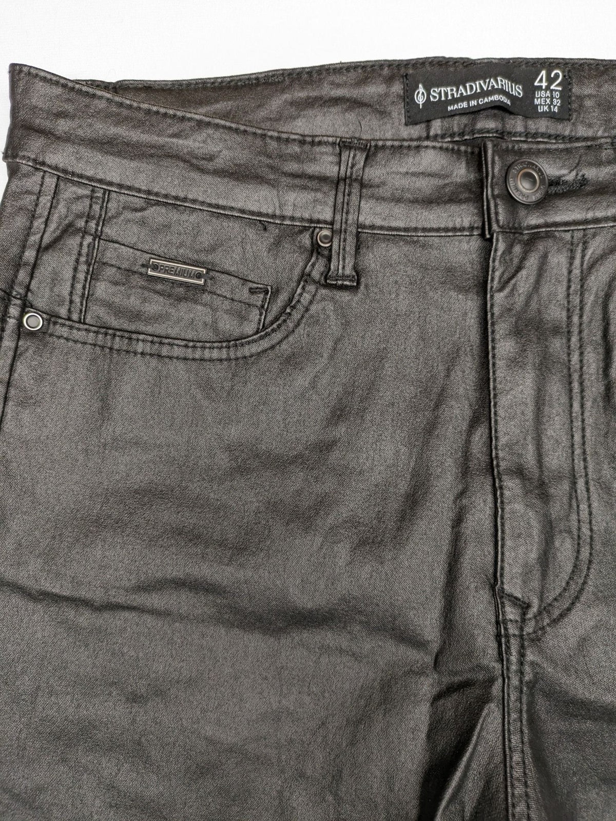 Stradivarius black coated straight jeans with leather-like finish and stretchy material.