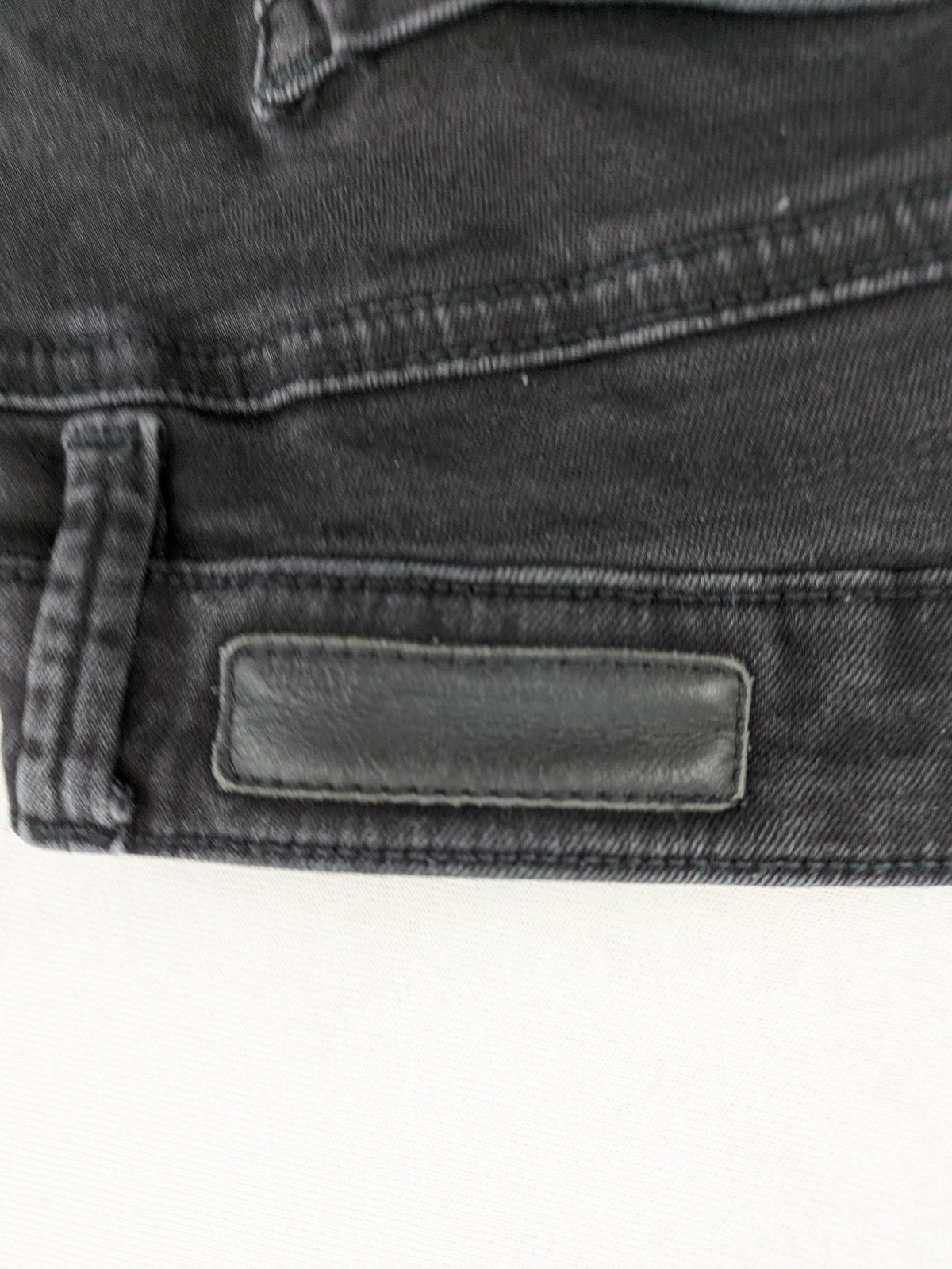 Tom Tailor Denim black extra skinny jeans, washed finish, stretch cotton blend, modern silhouette.