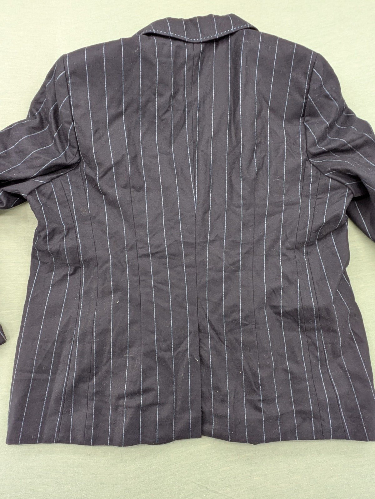 Bogner grey blazer with black pinstripes and contrast stitching, made of 100% virgin wool.