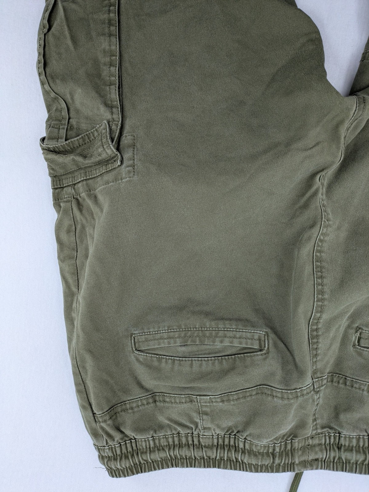 Denim & Co. khaki cargo jogger pants with elastic waistband and multiple pockets.