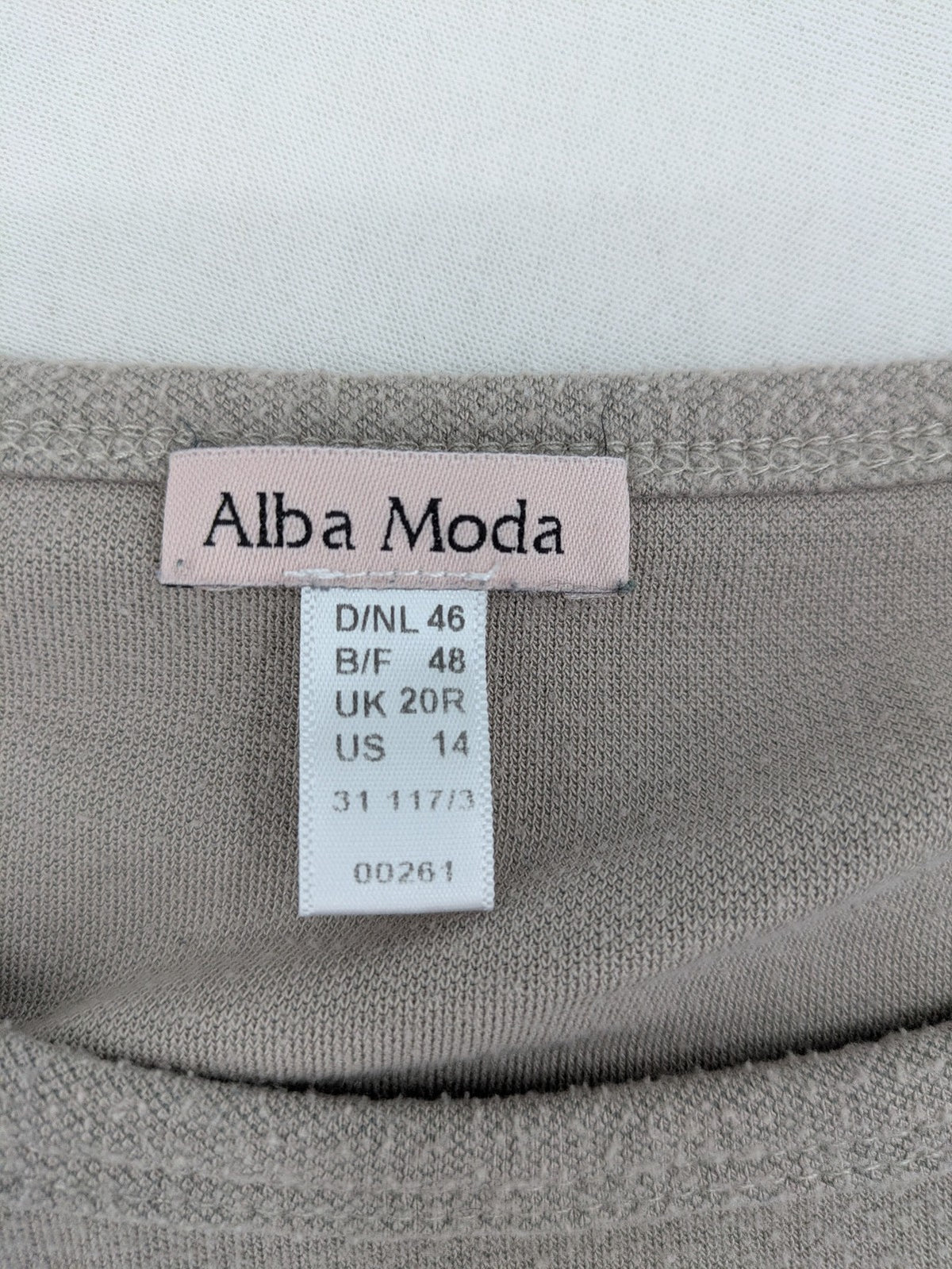 Alba Moda beige turtle neck jumper with plush faux fur cuffs and 3/4 sleeves.