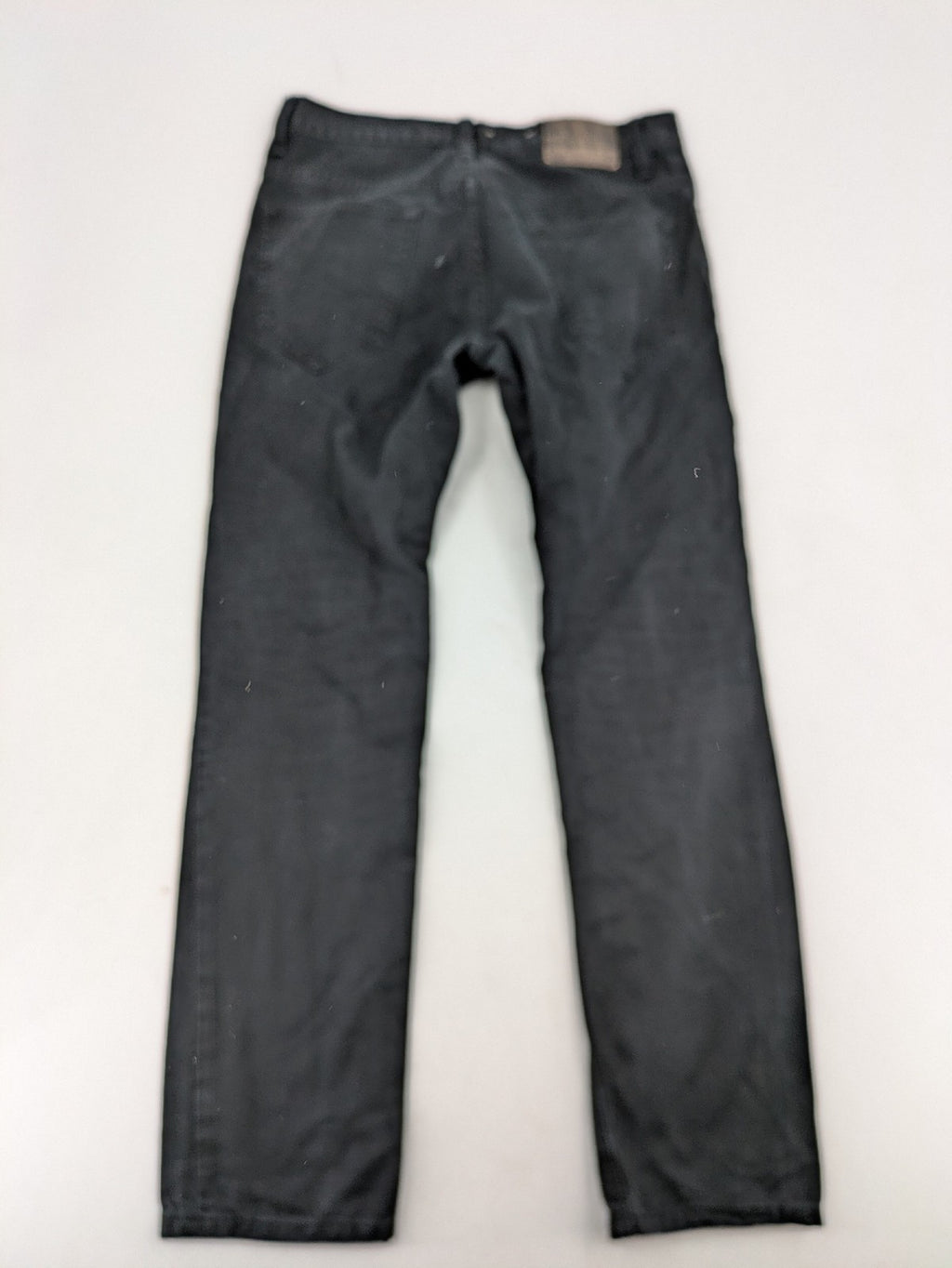 Ckh grey straight fit jeans with button fly and faded wash details.