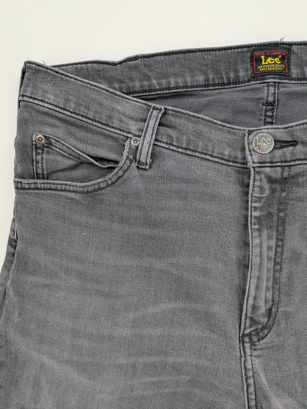 Lee straight jeans grey 5-pocket design with subtle branding on back pocket.