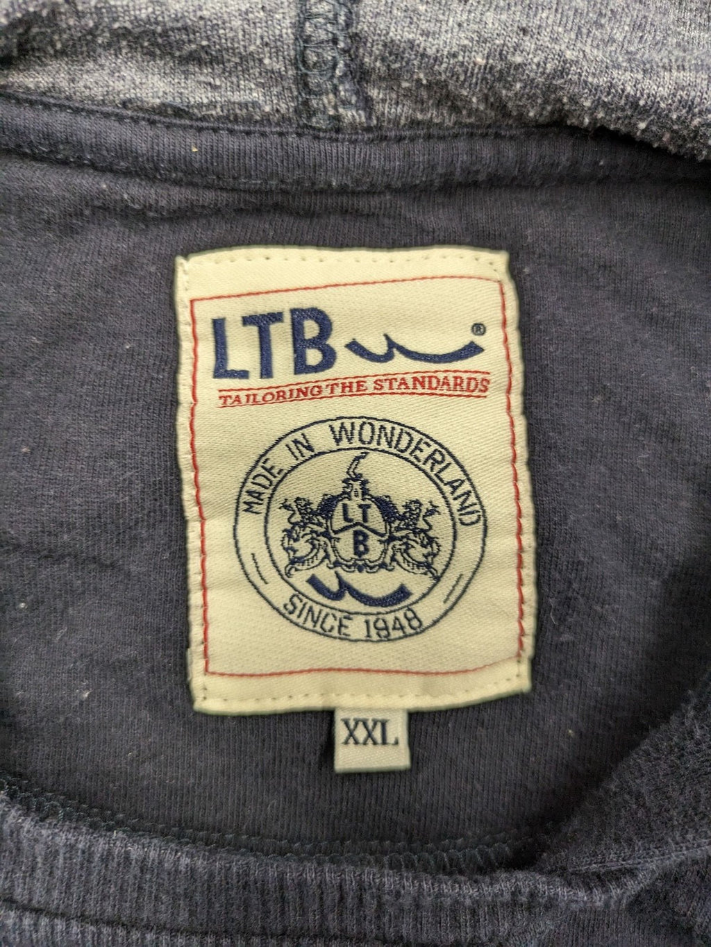 LTB black faded hoodie with adjustable drawstring and embroidered logo on sleeve.