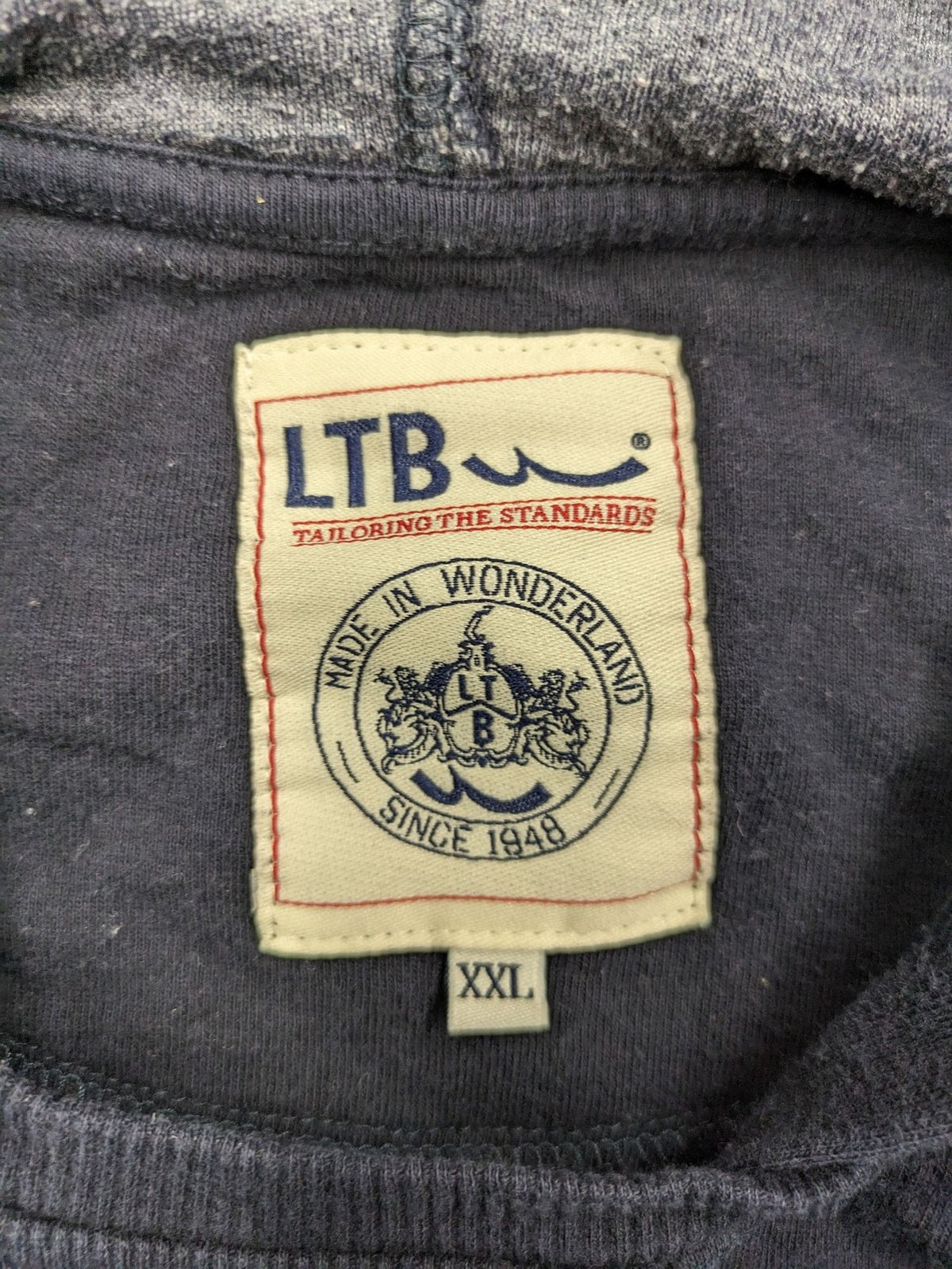 LTB black faded hoodie with adjustable drawstring and embroidered logo on sleeve.