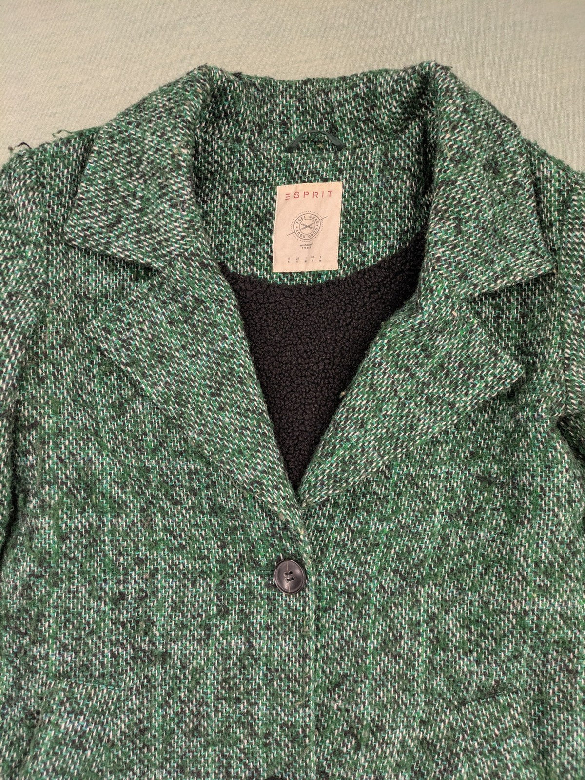 Esprit green black white tweed coat with notch collar and three-button closure.