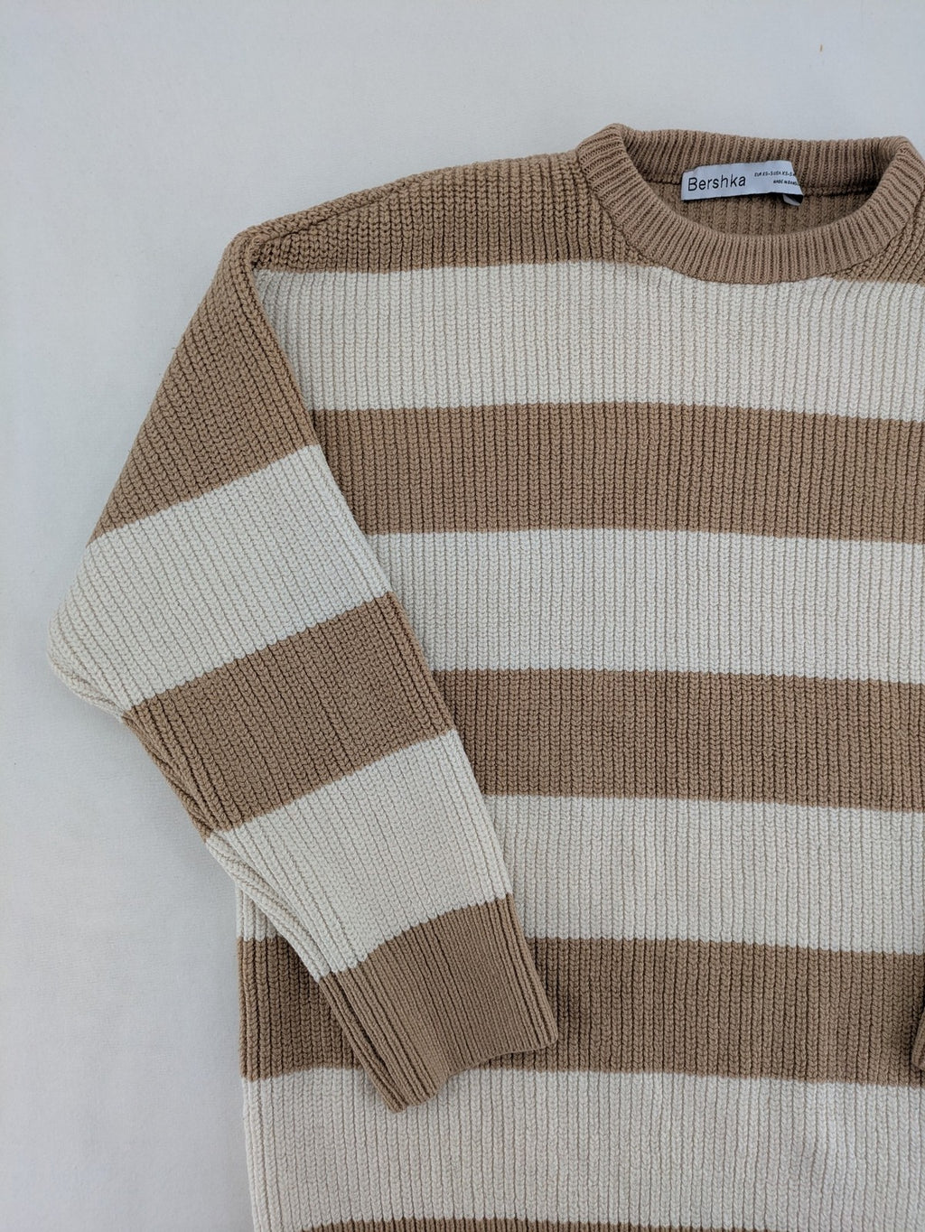 Bershka cream turtle neck jumper with brown and white striped pattern in ribbed knit.
