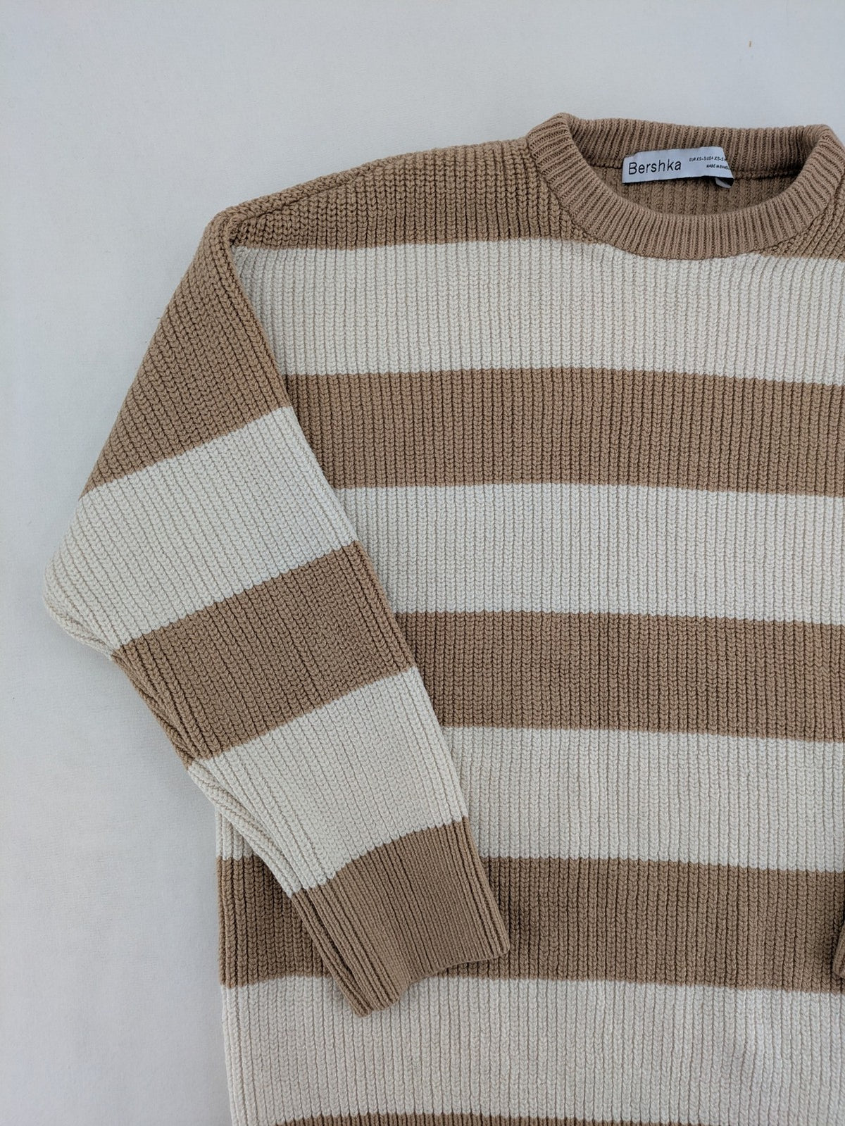 Bershka cream turtle neck jumper with brown and white striped pattern in ribbed knit.