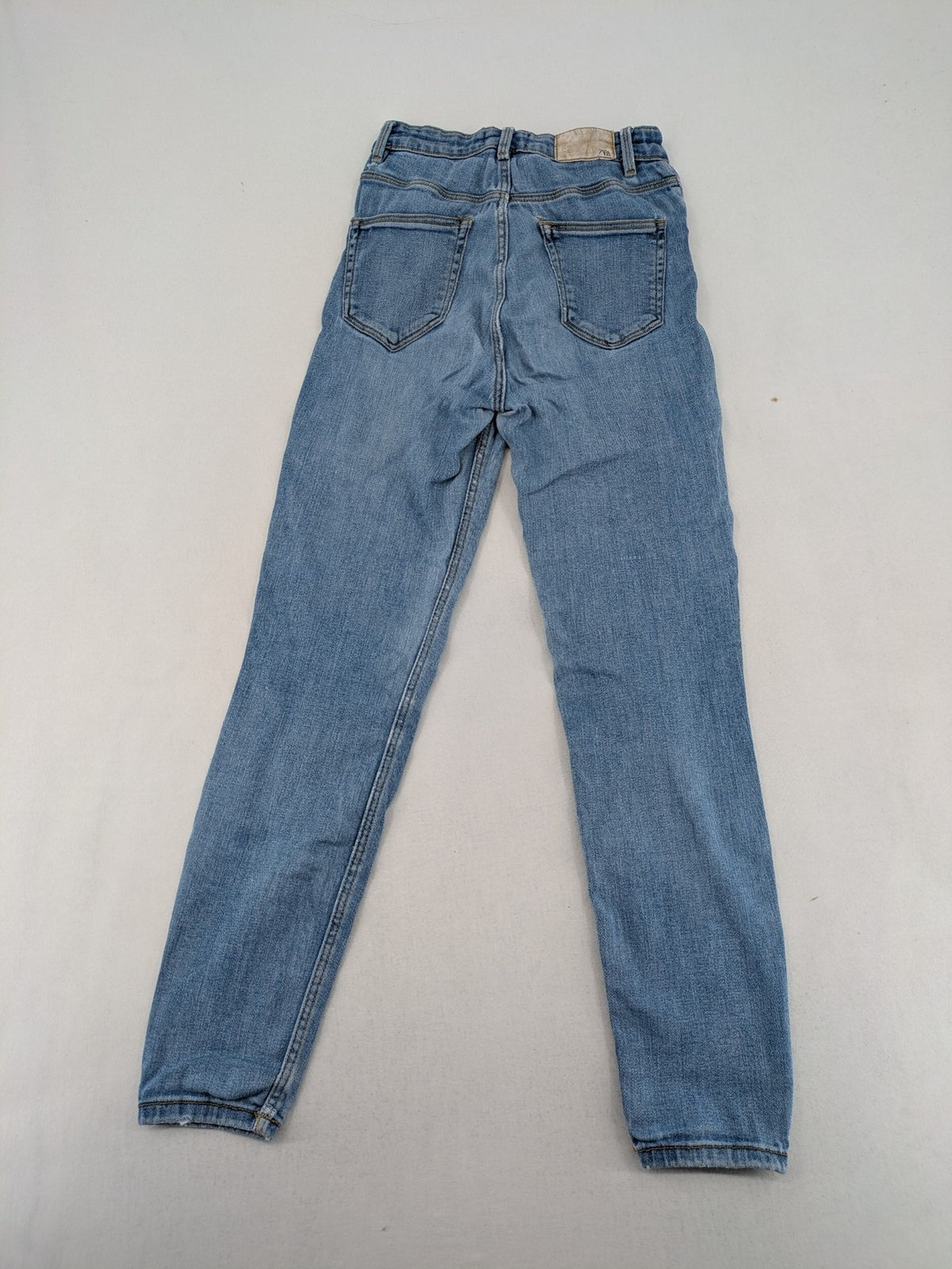 Zara blue high waist skinny jeans with classic wash and JOIN LIFE logo.