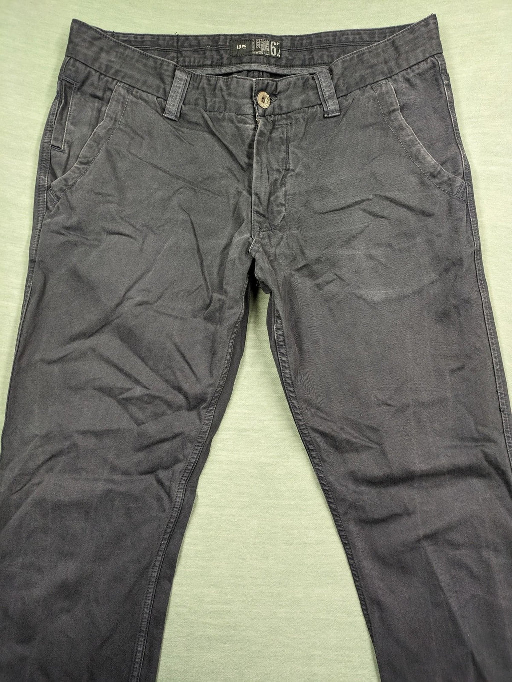 WE pink straight fit pants 100% cotton with zipper fly and belt loops.