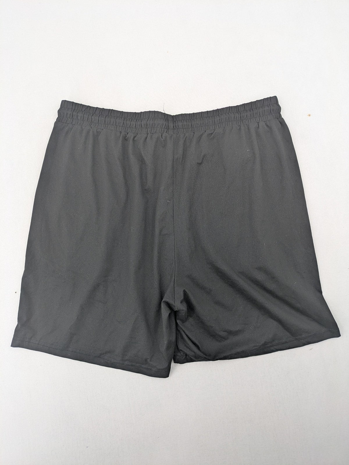 Manfinity loungewear set black T-shirt and shorts with Paris graphic print.