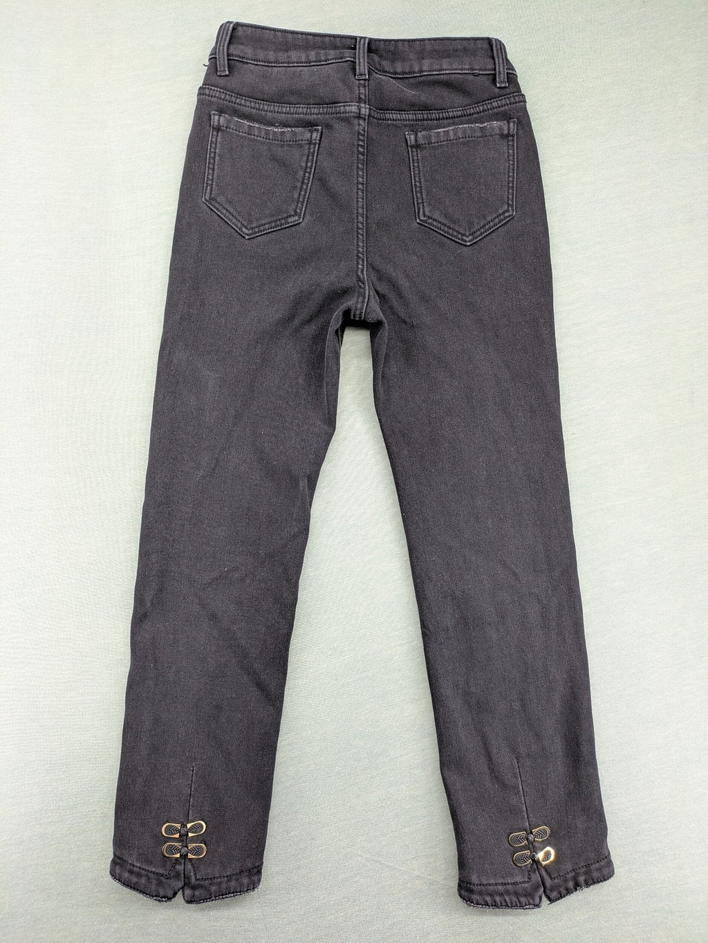 Disney black straight jeans with Minnie Mouse detail, cropped length, stretchy cotton blend.