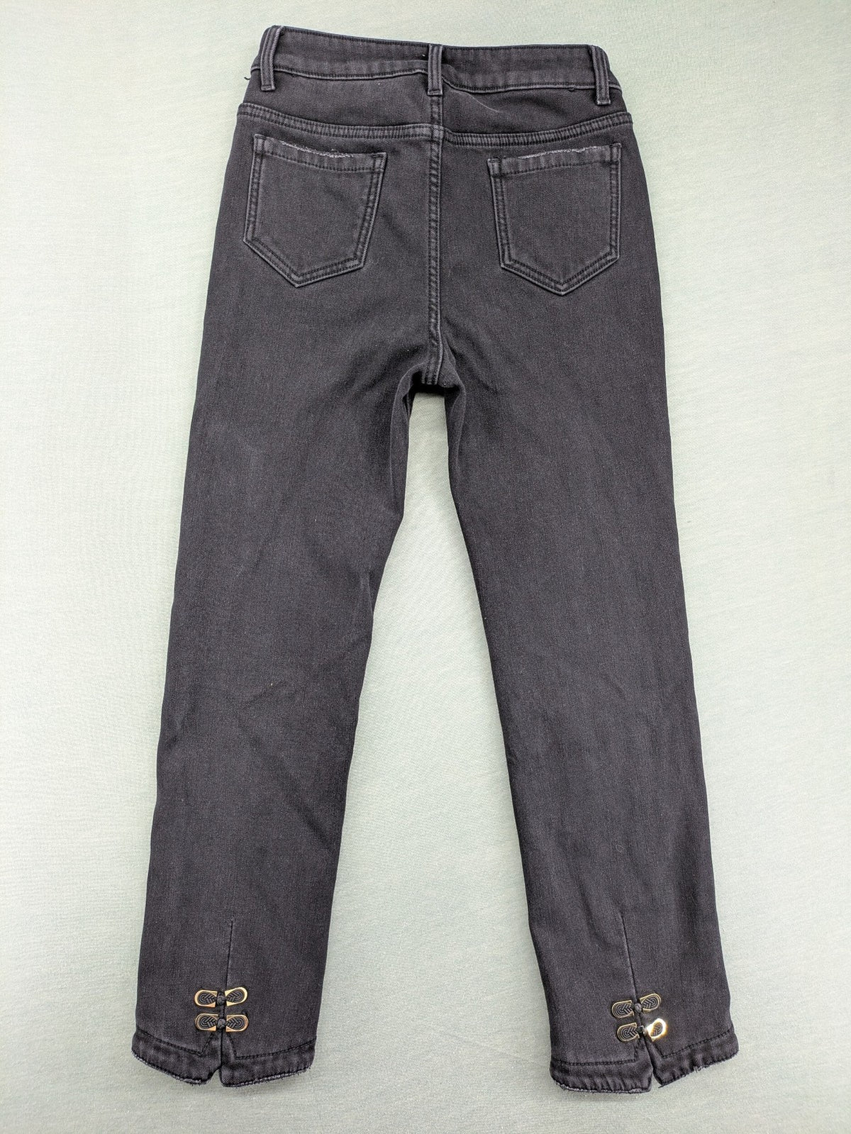 Disney black straight jeans with Minnie Mouse detail, cropped length, stretchy cotton blend.