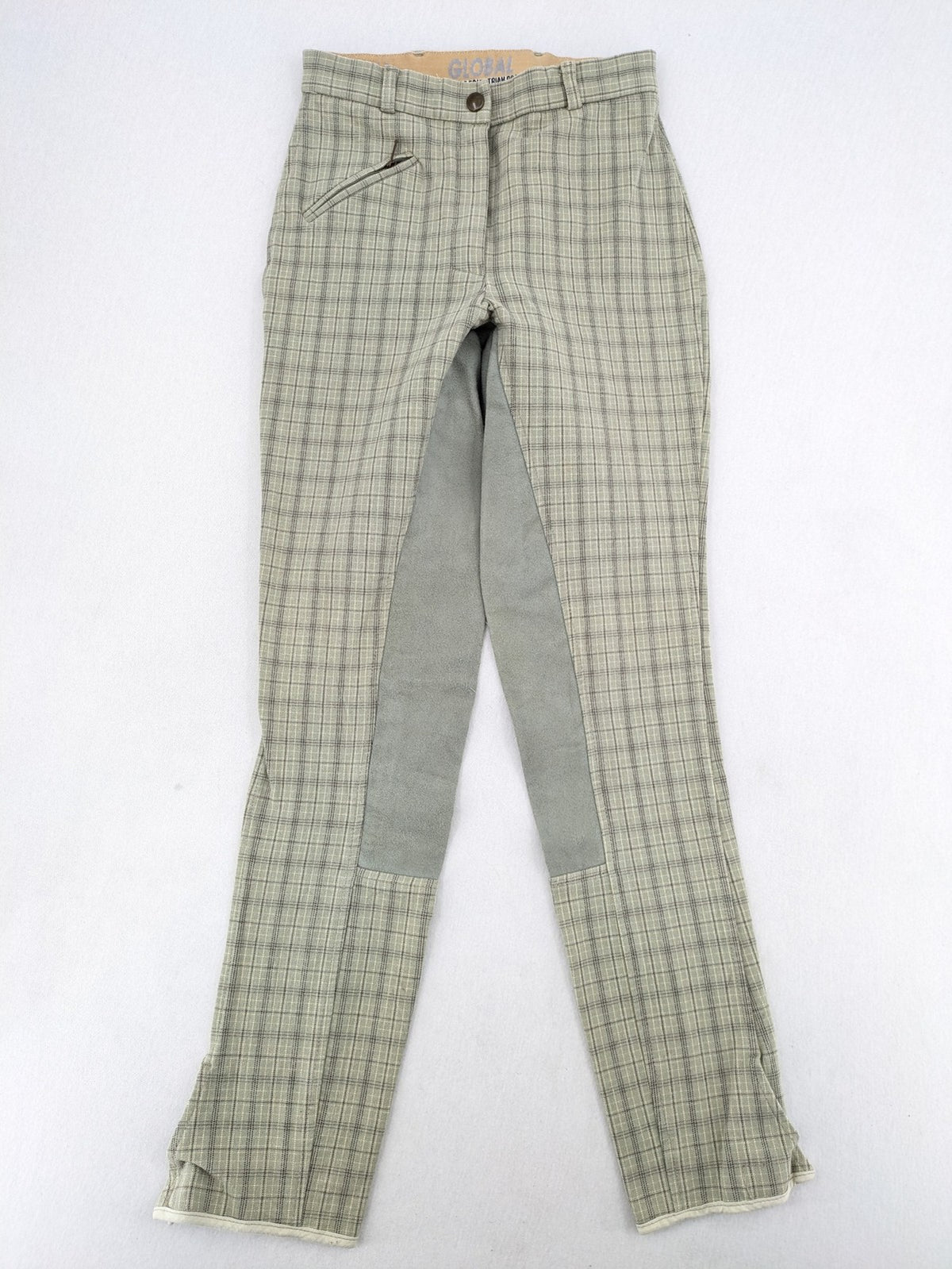 Jodhpur beige and grey riding pants with green check pattern and knee patches.
