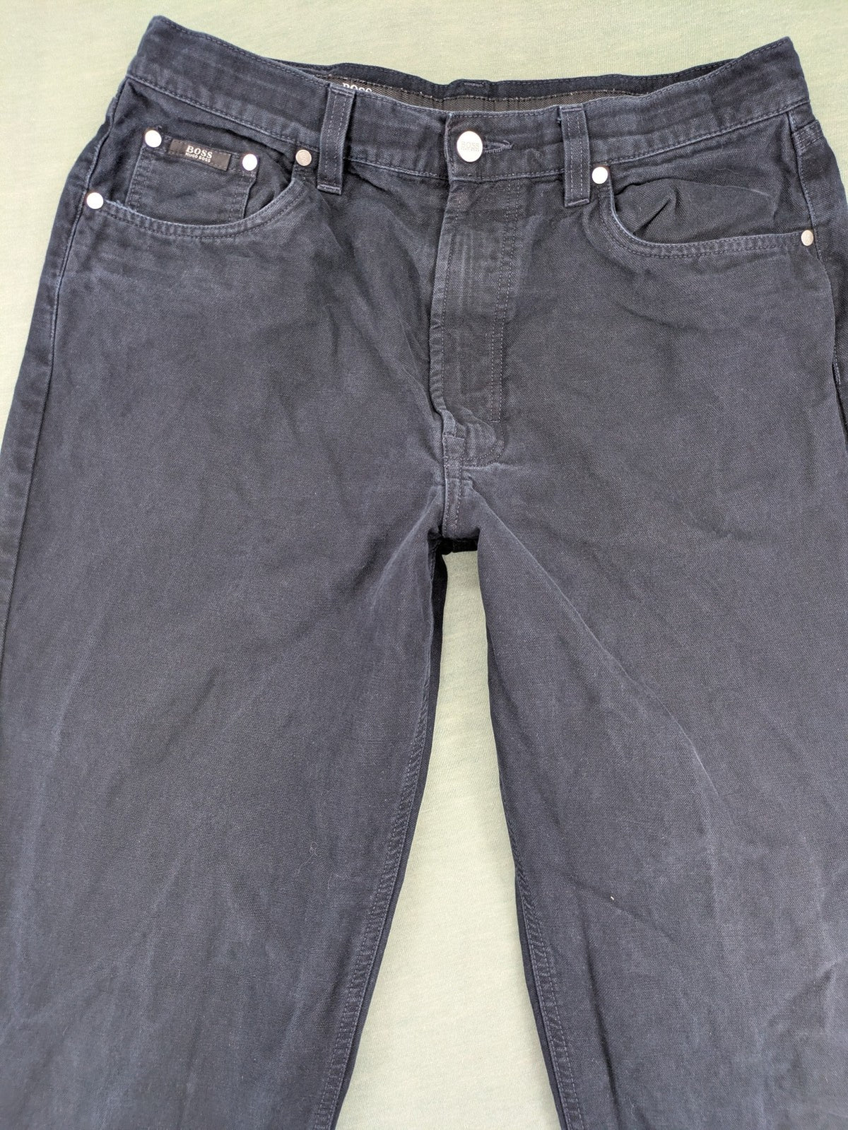 BOSS Hugo Boss grey straight jeans classic 5-pocket design with leather patch.