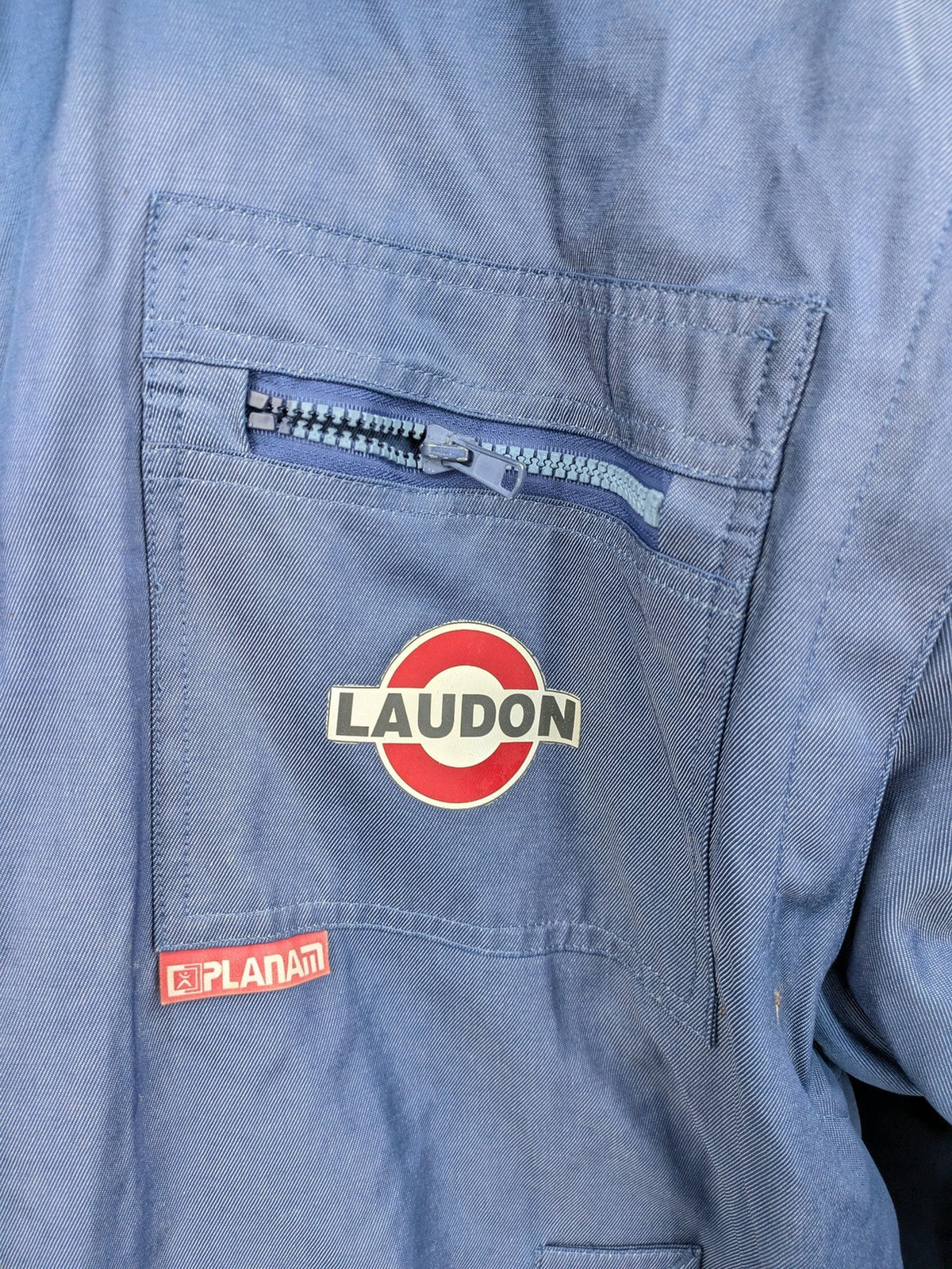 Planam blue bomber jacket with Teddy fleece lining and Laudon logo on chest.