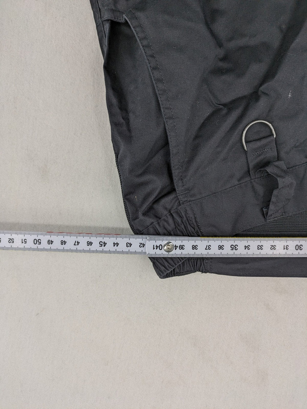 DHL grey cargo pants with iconic logo and multiple pockets, made from stretch cotton.