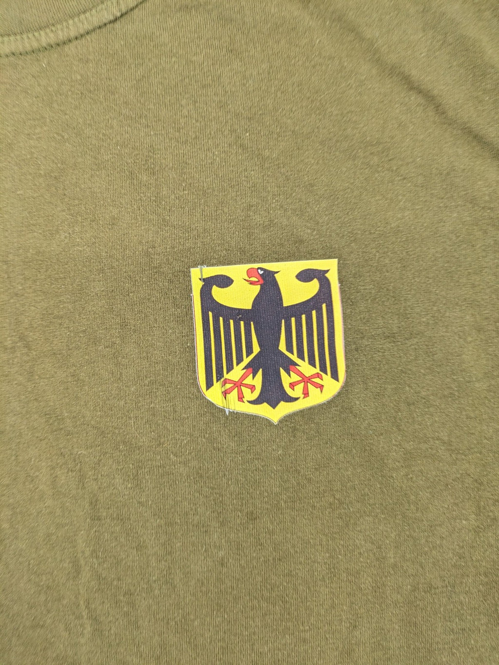Parforce khaki t-shirt featuring German eagle patch on left chest, 100% cotton.