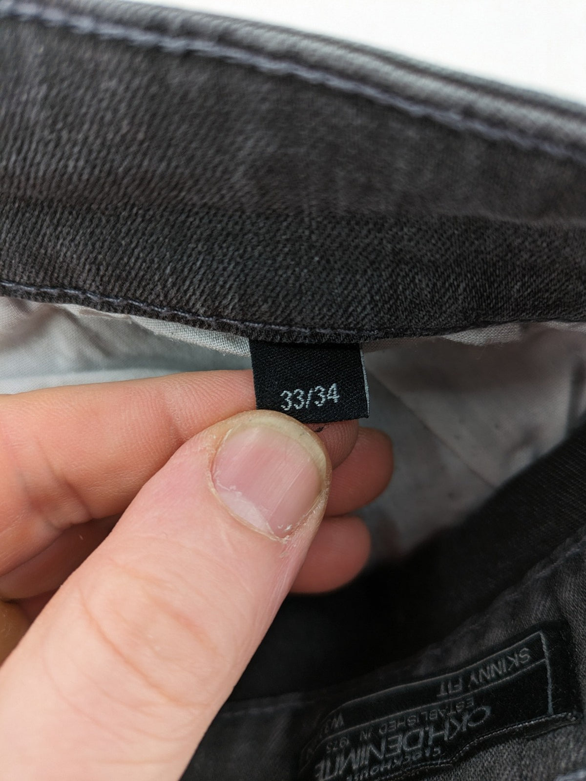 Clockhouse grey skinny fit jeans with biker ribbed panels and subtle distressed details.