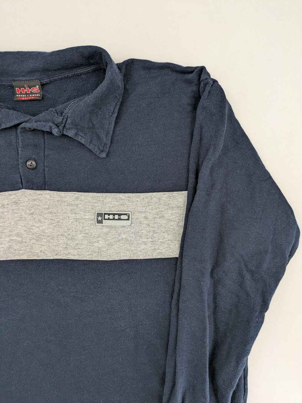 H.I.S navy turtle neck jumper with grey horizontal stripes and classic polo collar.