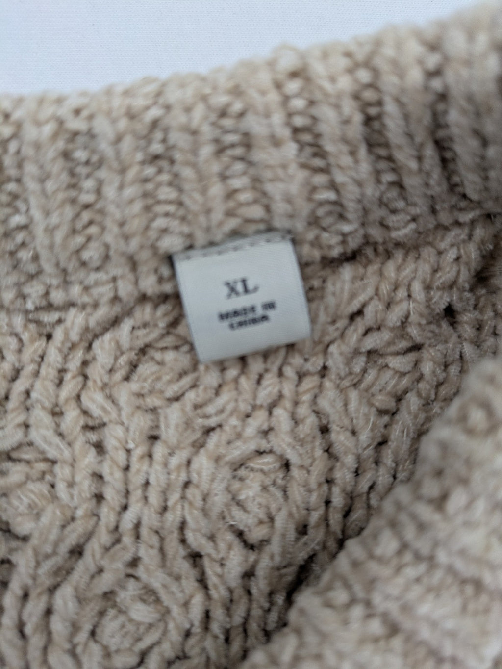 Scotch & Soda beige turtle neck jumper with intricate cable knit pattern.