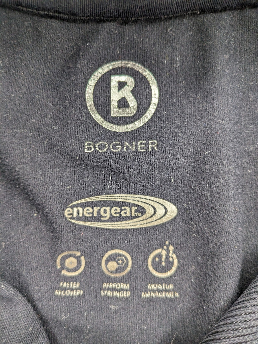 Bogner black turtle neck jumper with red and white striped sleeves and 1/4 zipper.