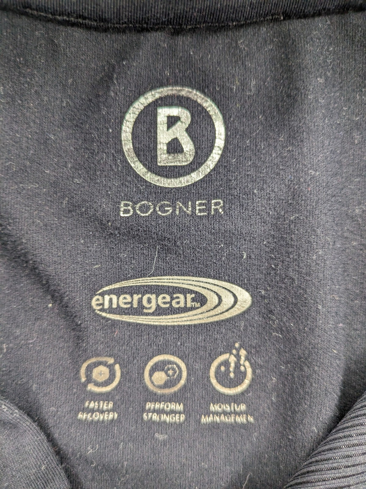 Bogner black turtle neck jumper with red and white striped sleeves and 1/4 zipper.
