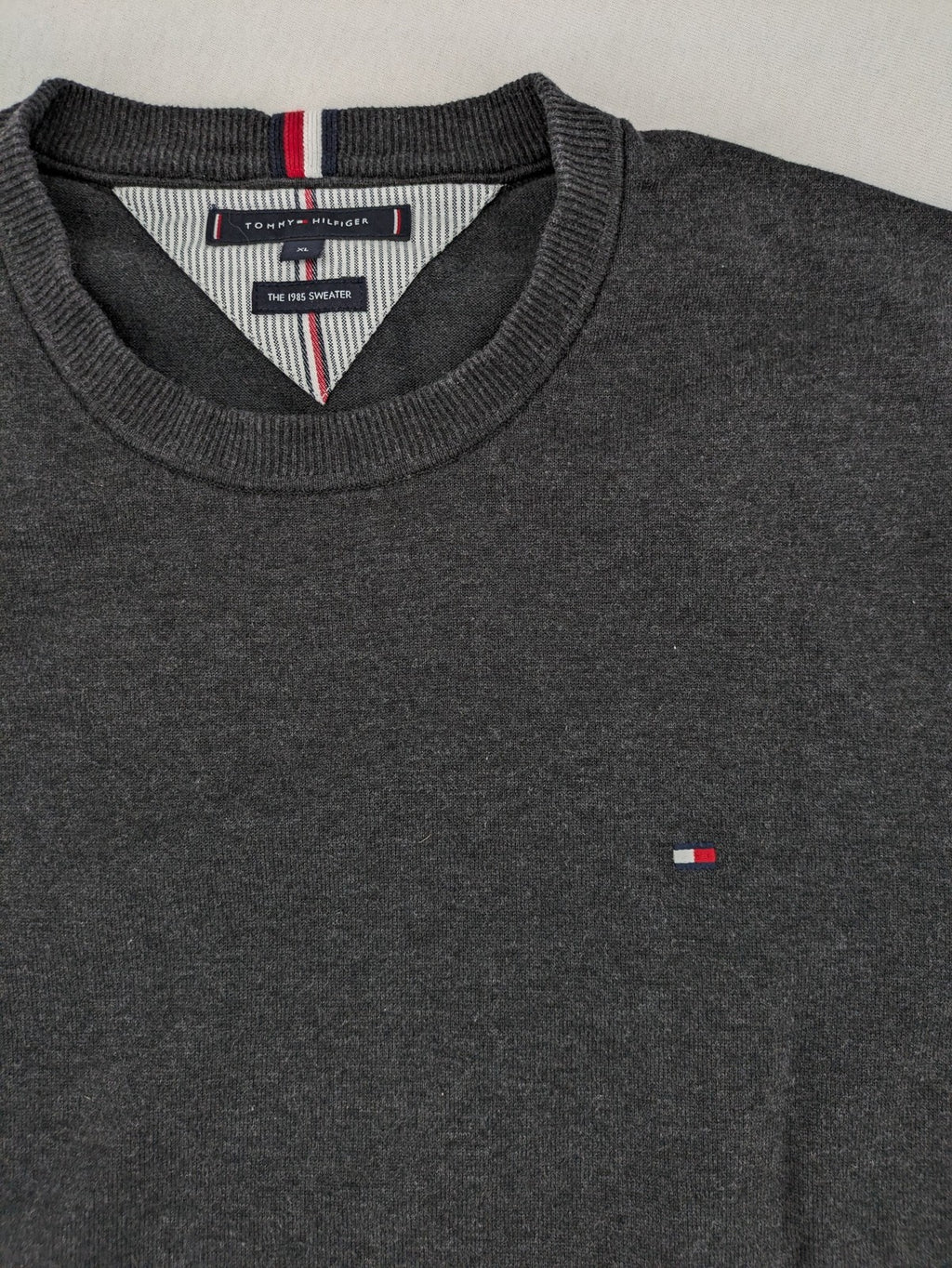 Tommy Hilfiger grey turtle neck jumper with embroidered flag logo on chest.