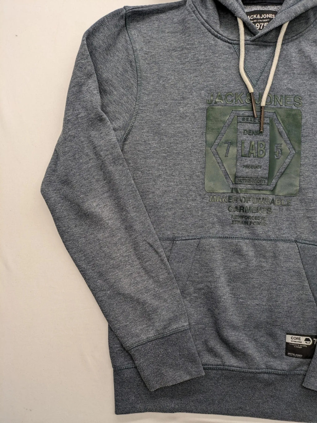 Jack & Jones green-grey hoodie with "Denim Lab" graphic, drawstring hood, kangaroo pocket.
