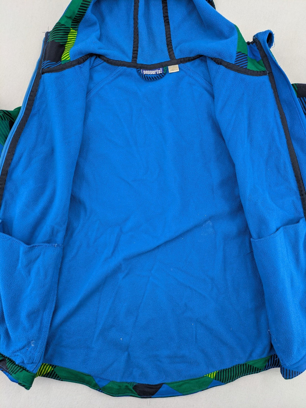 Pepperts multi softshell jacket plaid pattern blue green black, fleece lined, hooded.