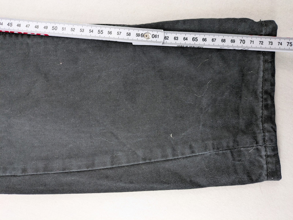 Ckh grey straight fit jeans with button fly and faded wash details.