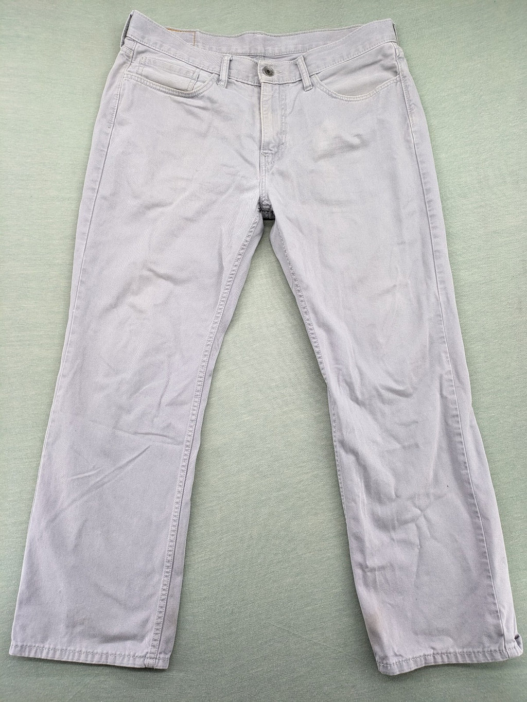Levi's straight jeans purple classic 5-pocket design with iconic leather patch.