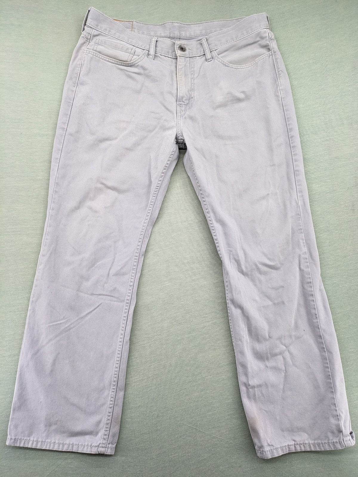 Levi's straight jeans purple classic 5-pocket design with iconic leather patch.