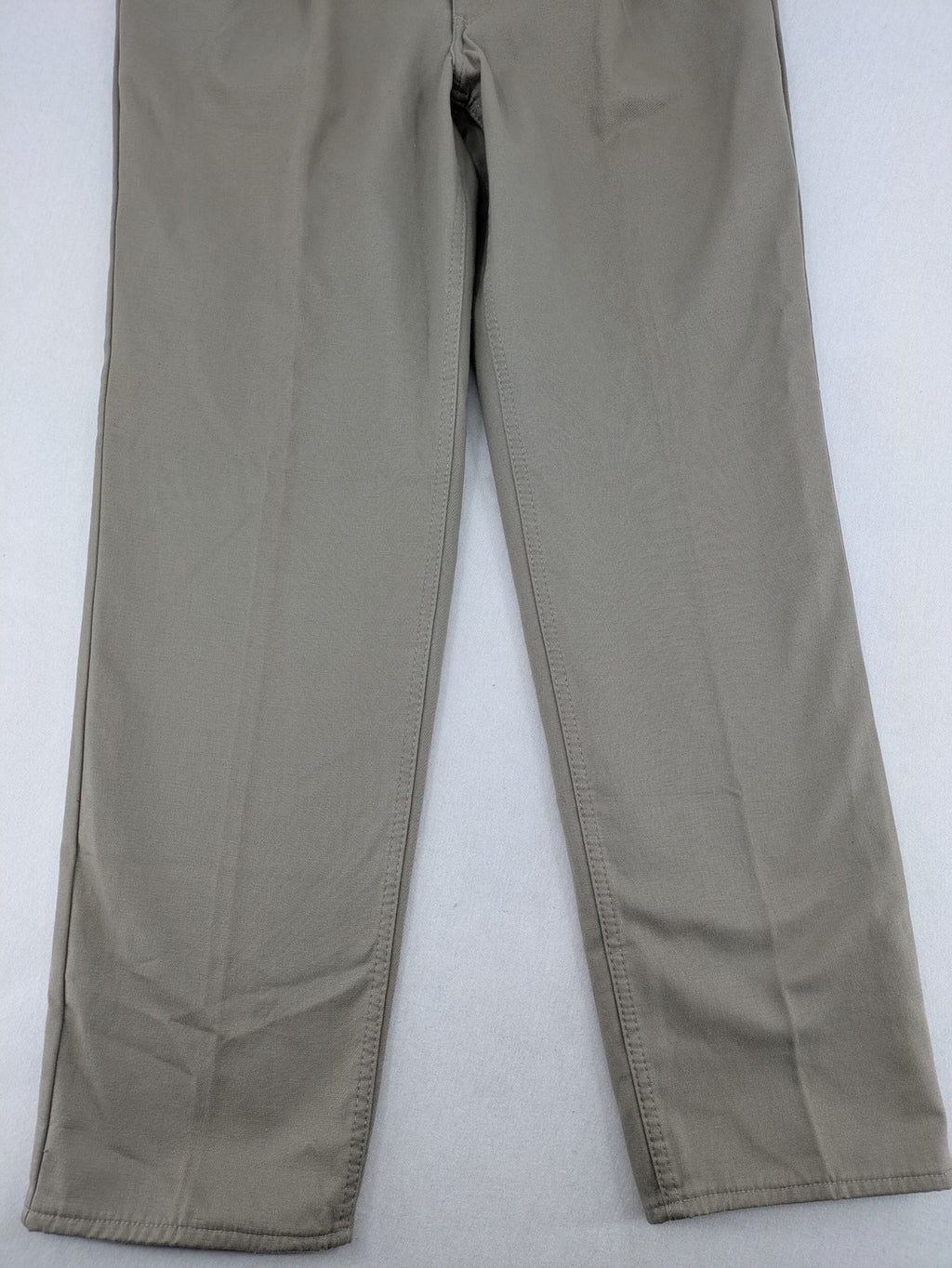 Pioneer beige chino trousers with pleats, straight leg, and buttoned back pocket.