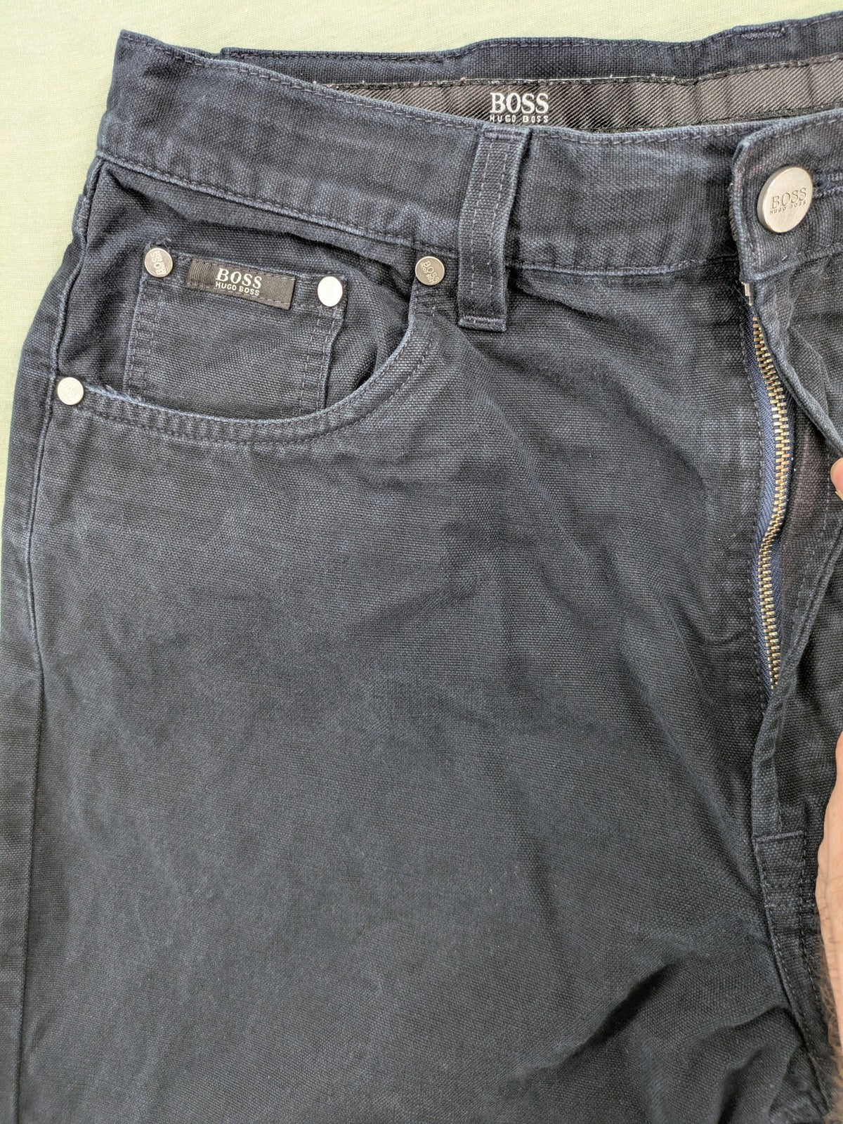 BOSS Hugo Boss grey straight jeans classic 5-pocket design with leather patch.