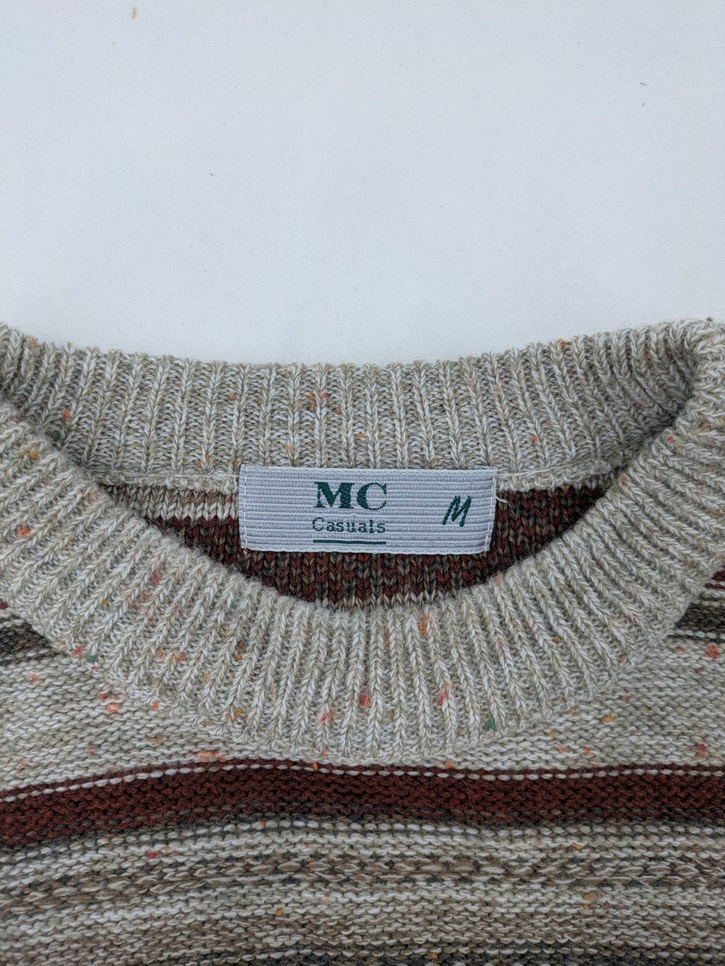 MC Casuals multi turtle neck jumper vintage striped pattern in brown and grey acrylic.