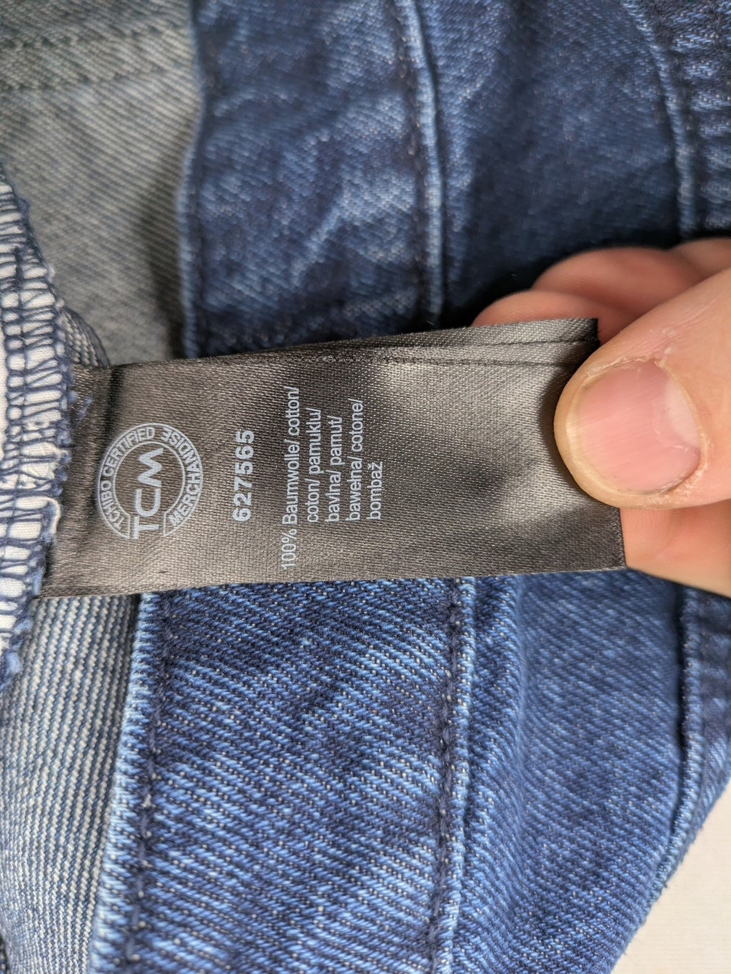 Tchibo blue straight jeans with five-pocket design and wide leg cut in durable cotton.