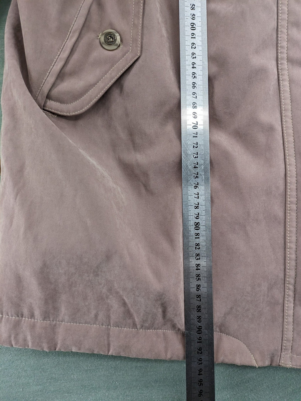 Goldix beige coat with checkered lining and Sympatex waterproof technology.