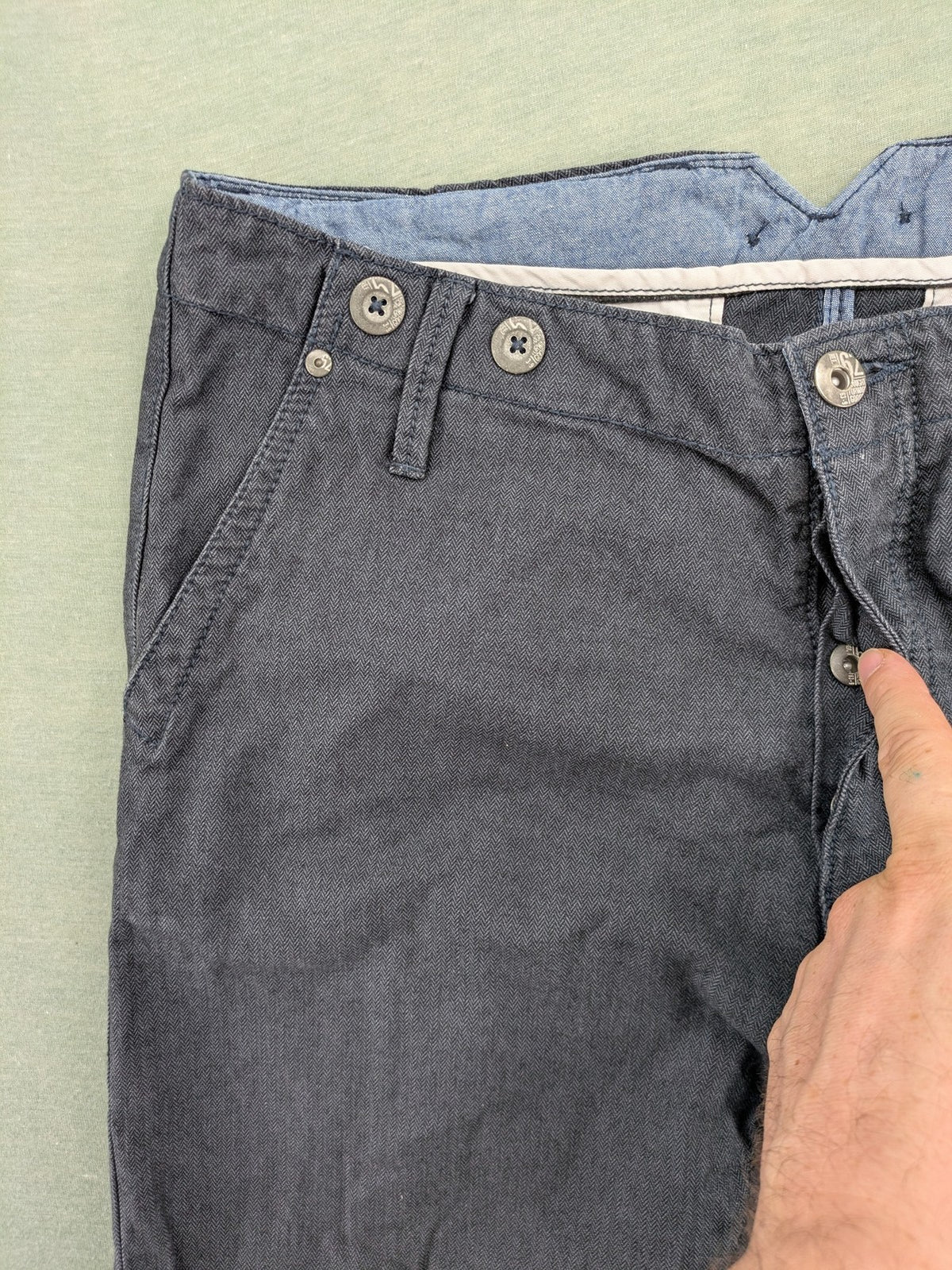 WE grey straight leg chinos 100% cotton button fly with unique brand buttons