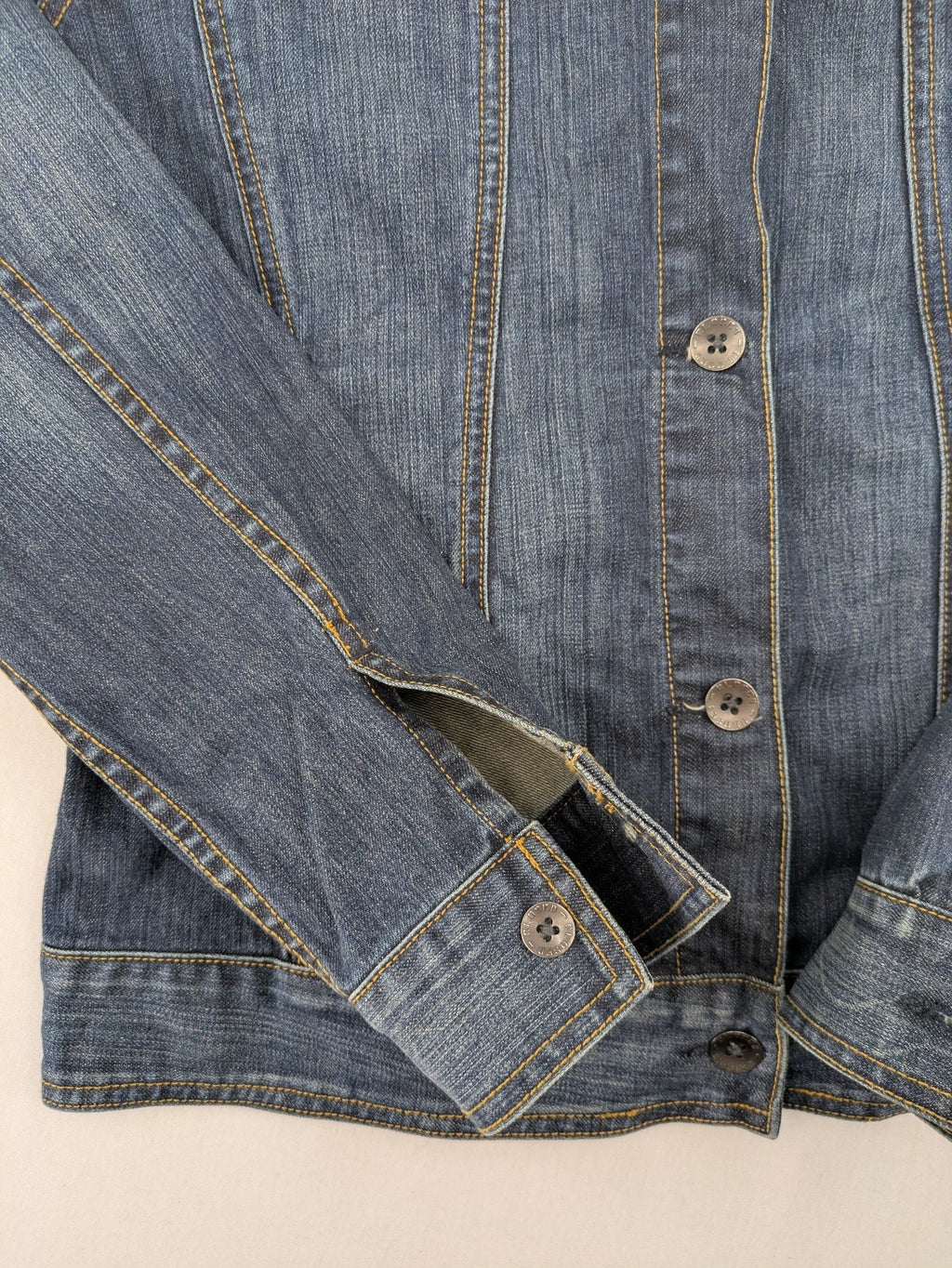 CLOSED blue denim trucker jacket with button front and two chest pockets.