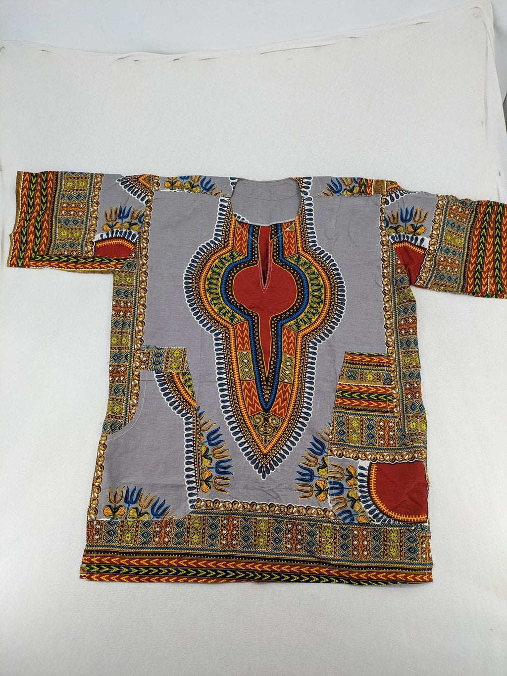 Kaftan multi Dashiki top grey with tribal patterns and front pockets, V-neck design.