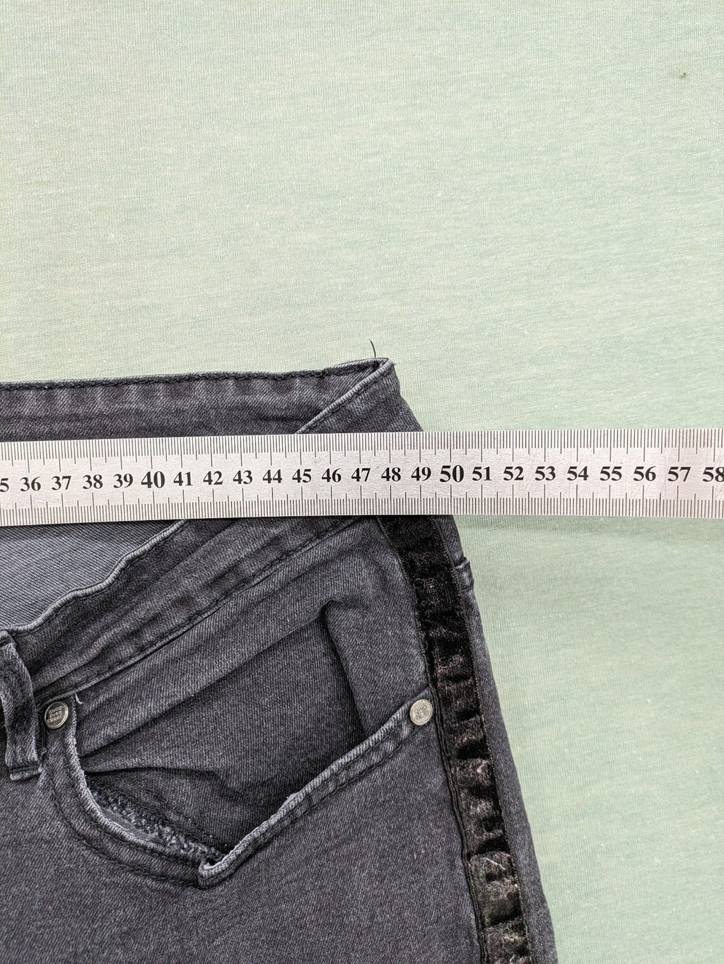 ROCK YOUR CURVES black tapered jeans with grey velvet side stripes and faded wash.