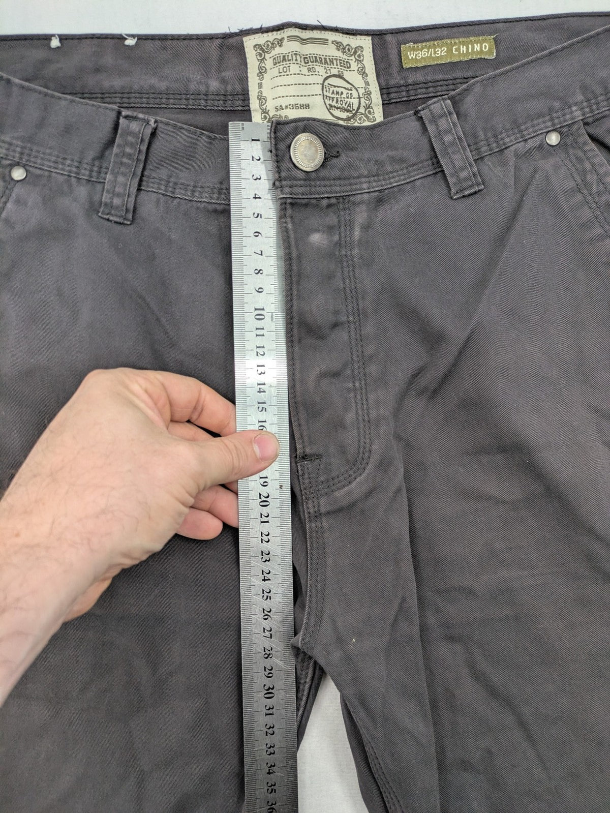 Denim & Co. grey chino pants cotton workwear with button fly and pocket rivets.