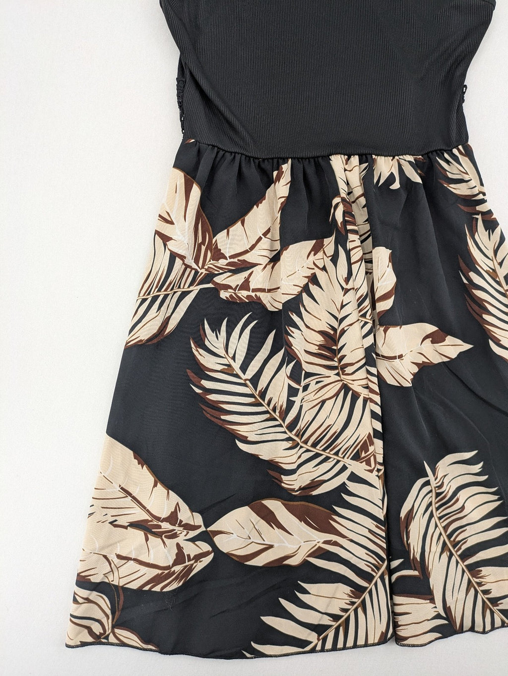 Kontrast summer dress beige tropical leaf print with black ribbed tank top and lace trim.