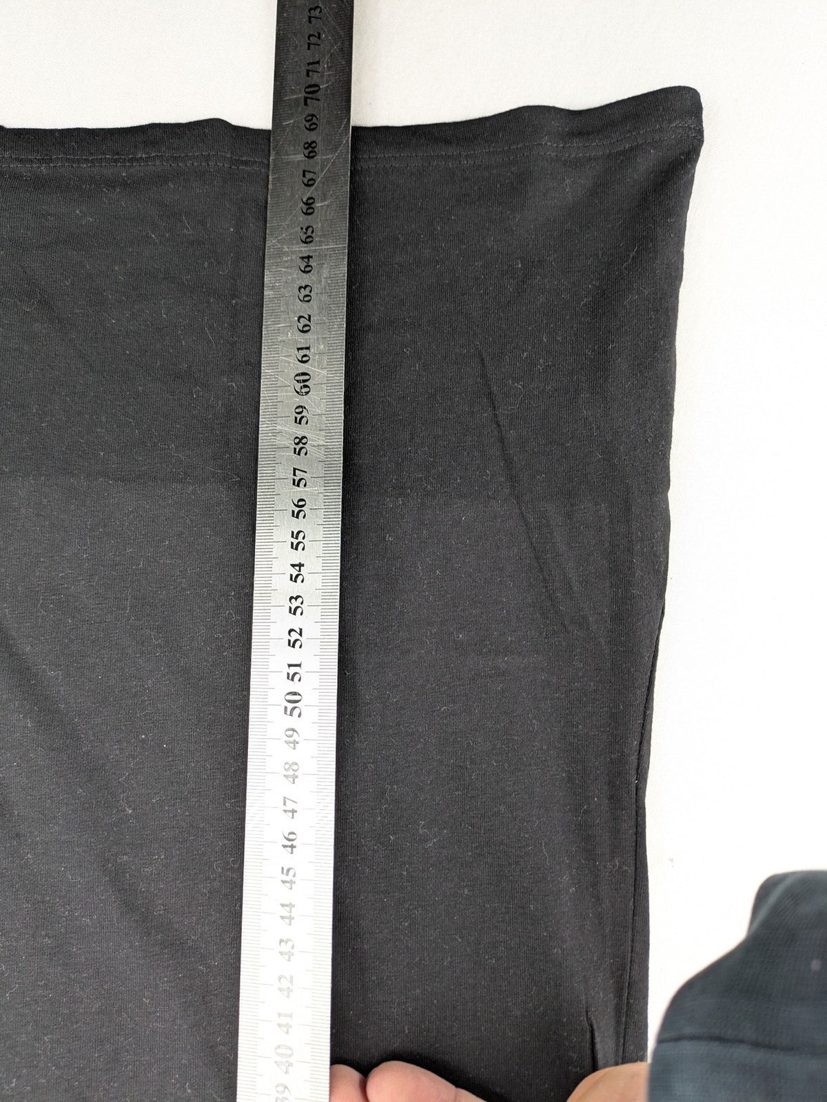 Primark black graphic t-shirt featuring yellow and white Pornhub logo on chest.