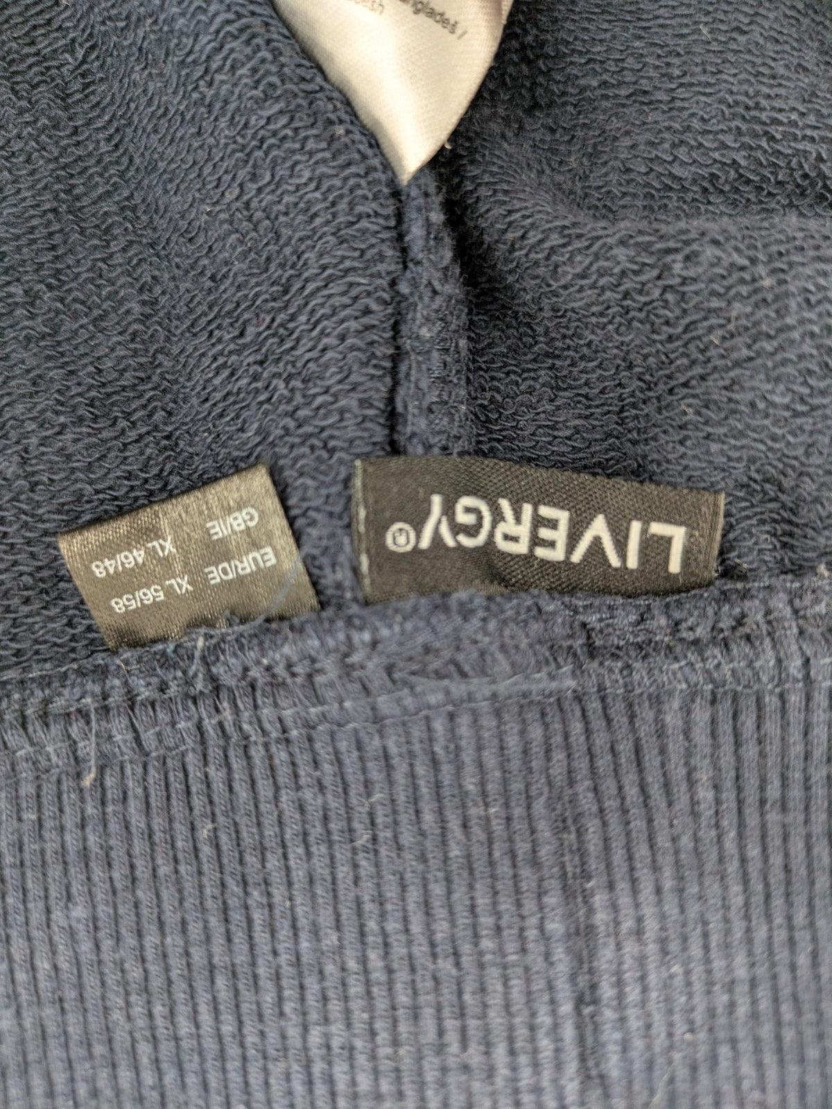 Livergy blue sweatshorts with "Northeast Sailors" graphic print and elastic waistband.