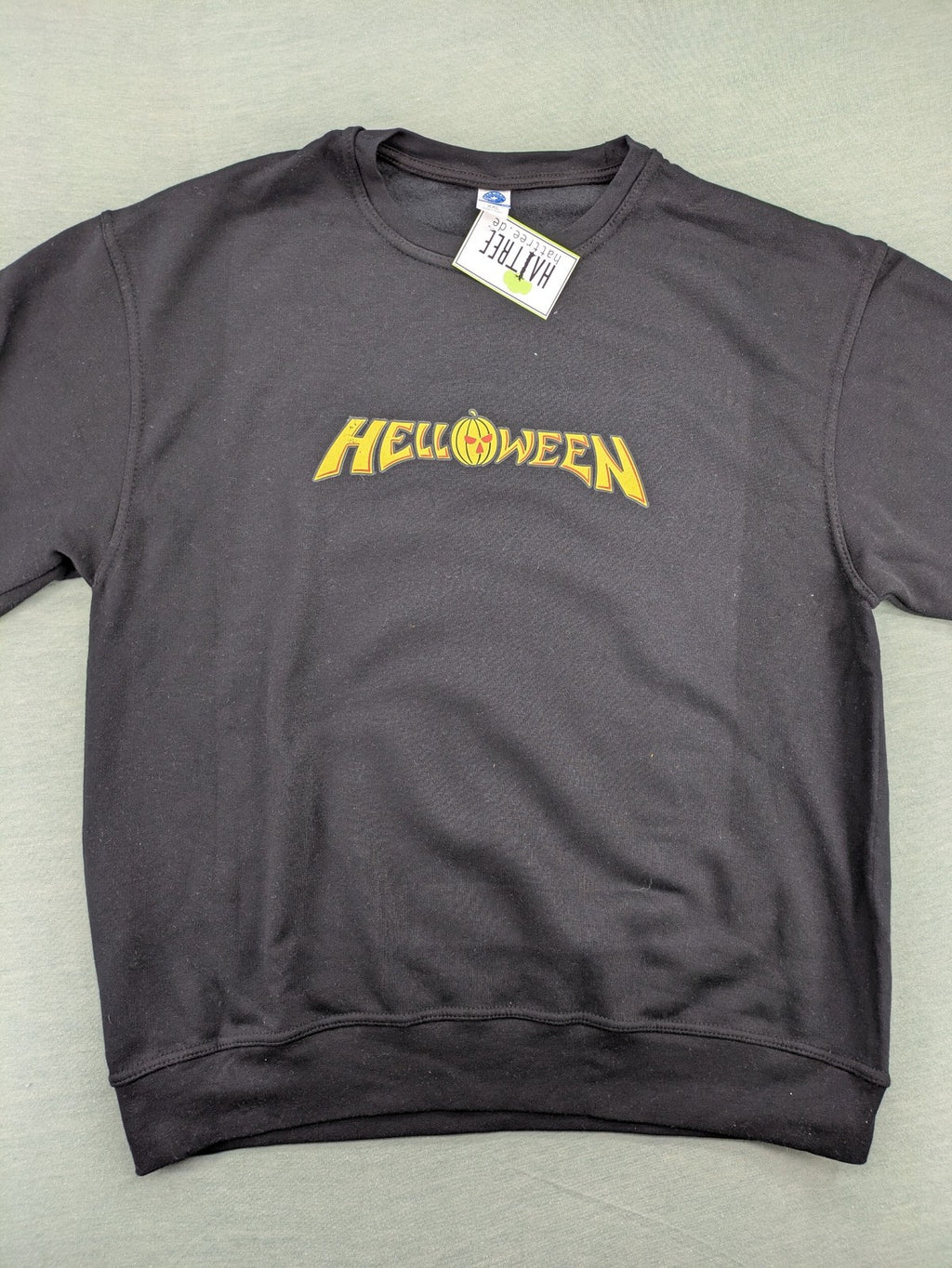 Helloween grey sweatshirt featuring bright yellow band logo, made from cotton blend.