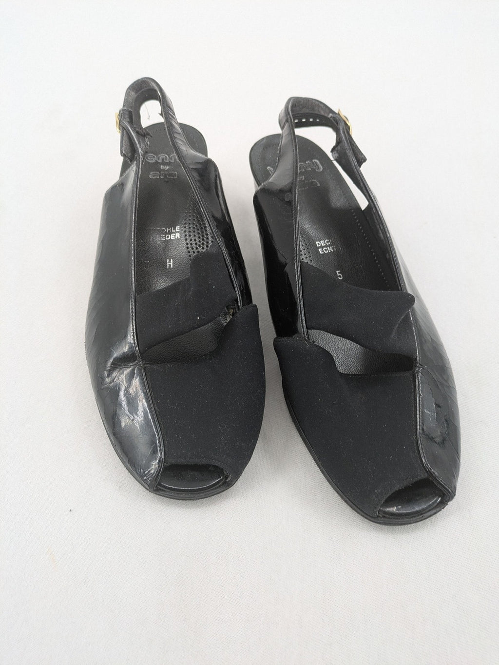Jenny by Ara black slingback pumps with peep-toe front and glossy finish.