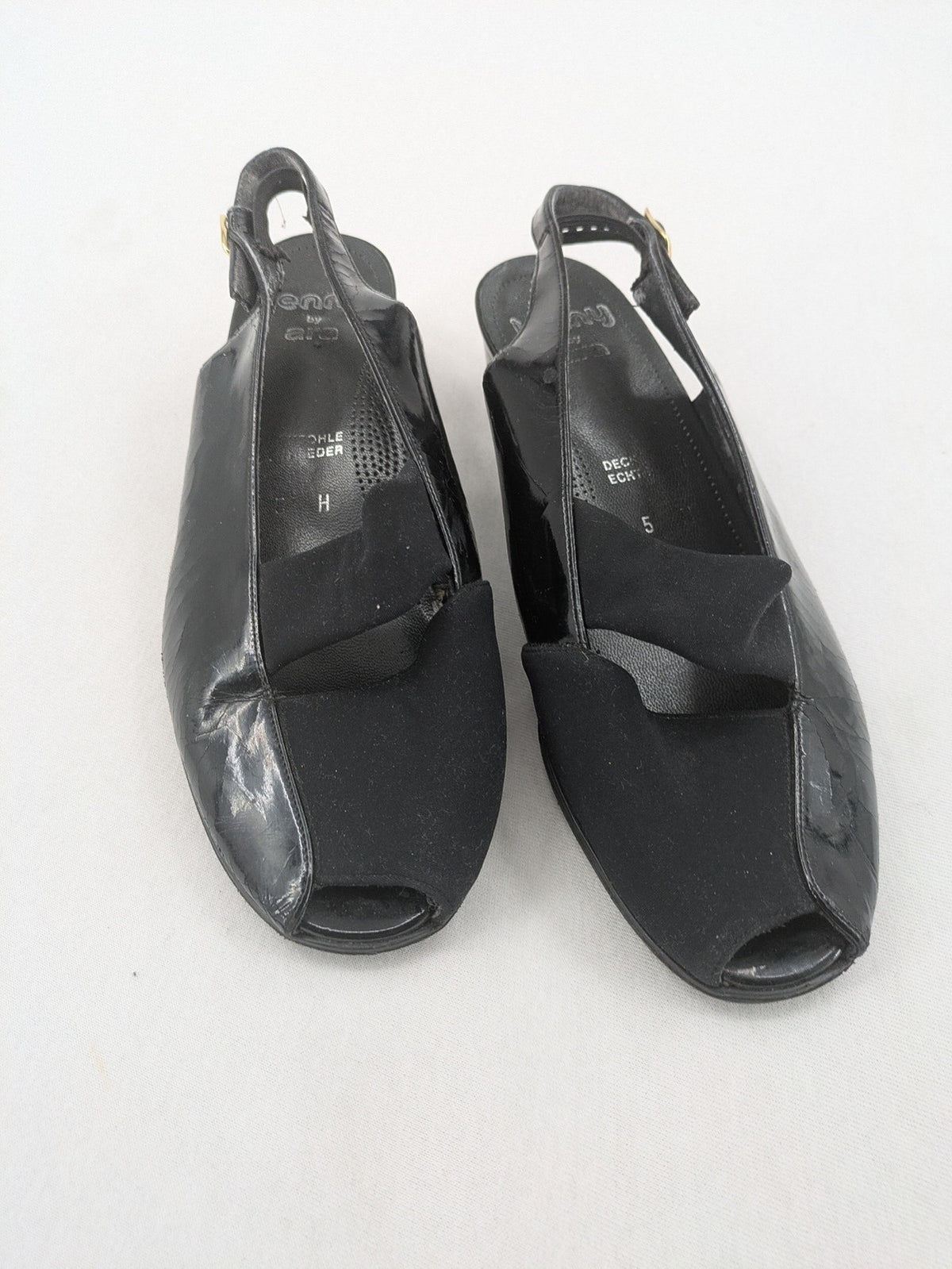 Jenny by Ara black slingback pumps with peep-toe front and glossy finish.