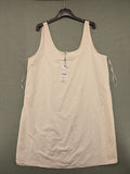 Zara cream tank top, sleeveless design, smooth polyamide fabric, minimalist style.